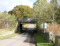 Approaching Bowland from the west on 19 October 2011. The signal box was on the north side of the bridge with the platforms to the south. The passenger entrance was on the right with a stairway leading to the down platform. Access to the up platform was via a barrow crossing. Entrance to the former goods yard is on the other side of the bridge to the left. The makers plate on the bridge reads 'Somervail & Co - Dalmuir Iron Works - Dalmuir'. [See image 25514]<br><br>[John Furnevel 19/10/2011]