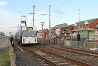 St Stephens Avenue was a typical rail level tram stop on the Bispham cliffs. It closed two weeks after this photo was taken, being replaced in 2012 by the new stop at nearby Lowther Avenue. Two passengers wait to cross the lines after alighting from tram 643, which was routed to Little Bispham. This tram was also withdrawn in November 2011 and later went to the Broadwater Caravan Park near Fleetwood to serve as a cafe and gift shop.[See image 42562]   <br><br>[Mark Bartlett 26/10/2011]