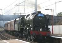 46115 <I>Scots Guardsman</I> charges through Oxenholme station on 1 October 2011 with the Crewe to Carlisle 'Train of Hope' charity railtour. The tour was running almost an hour late due a failure of the diesel locomotive taking the ecs to Crewe.<br><br>[John McIntyre 01/10/2011]