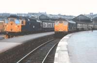 Archetypal scene at Inverness platforms 5 and 6 in summer 1973, with the mid-morning departures for Kyle and Wick/Thurso ready for the road.<br><br>[David Spaven //1973]