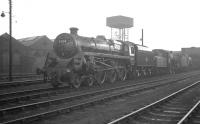 BR Standard class 5 4-6-0 no 73130 of 26F Patricroft stands on Darlington shed in January 1964 following a visit to the nearby works.<br><br>[K A Gray 25/01/1964]