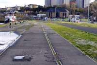 One of the few remaining traces of the dock railways at Albert / Victoria Harbours, Greenock, on 27 October 2011. A far cry from the fondly-remembered days of 'Beetlecrushers' and Fowler Dock Tanks.<br><br>[Colin Miller 27/10/2011]