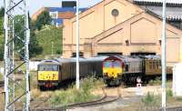 Class 31 and 66 locomotives with PW works trains in the CE sidings at Old Oak Common in July 2005.<br><br>[John Furnevel 21/07/2005]