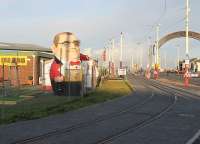 Another <I>Then, Then and Now</I> comparison showing recent changes at the Starr Gate southern terminus of the Blackpool and Fleetwood Tramway. This view looks north from the old return loop to the new platforms and the section that is virtually completed now but awaiting the new trams and reopening in 2012. [See image 31269] for the same location in October 2010.<br><br>[Mark Bartlett 26/10/2011]