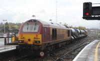 67027 is the trailing locomotive of a Network Rail RHTT at Didcot on 3 November 2011, sharing duties with 67008 [see image 36281].<br><br>[Peter Todd 03/11/2011]