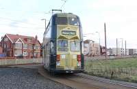 At Little Bispham, the temporary northern limit of operating, double deck car 719 has been round the turning circle and rejoins the <I>main line</I> to go back south to Pleasure Beach. <br><br>[Mark Bartlett 26/10/2011]