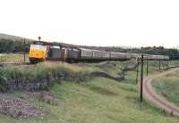 A WCML express hauled by a pair of EE Type 4s (later class 50)  heads south between Abington and Crawford on Glasgow Fair Friday 1969.<br><br>[Colin Miller /07/1969]