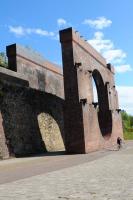 A passing cyclist is dwarfed by the partial remains of the coal staithes standing alongside the site of Wearmouth Colliery, Sunderland, in September 2010. The river Wear is just off picture to the right while a short distance to the left is the Sunderland FC 'Stadium of Light', built on the site of the old colliery. [See image 32352] Wearmouth Coal Company<br><br>[Brian Taylor 12/09/2010]