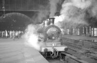 <I>'The Covenanter'</I> awaits its departure time from St Enoch on 20 October 1962 behind McIntosh 0-6-0 no 57581.<br><br>[R Sillitto/A Renfrew Collection (Courtesy Bruce McCartney) 20/10/1962]