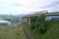 Two Skytrain units heading out of Vancouver in October 2011, destined for either VCC Clark or King George. To reach the former destination it would be a 45 minute journey through the eastern suburbs reaching VCC Clark Interchange which is 200m to the photographer's left - effectively having travelled in an open loop.  The line in the foreground is part of the main line system and goes to freight yards and Pacific Central Station. [See image 36404]<br><br>[Malcolm Chattwood 14/10/2011]