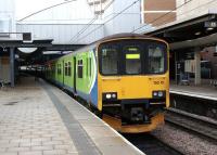 One of a number of West Midlands Class 150s to have migrated north recently (and not just for the winter) is seen waiting alongside platform 9d at Leeds on 4 November 2011 with a service to Selby. These 'green' units have also been seen in Blackpool, Preston, Liverpool and Manchester and make a change from the predominant 'blue' of the region's usual train services.<br><br>[John McIntyre 04/11/2011]