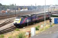 View west over the yards at Old Oak Common in July 2005 from the wall along the south side of the Grand Union Canal. A First Great Western HST is about to leave the carriage sidings on an empty stock working to Paddington, with North Pole Eurostar Depot standing on the other side of the GW main line.<br><br>[John Furnevel 21/07/2005]