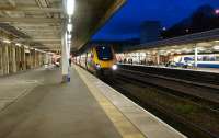 An Arriva Cross Country service to Plymouth in the hands of a Voyager unit calls at Platform 5 of Sheffield station on 4 November 2011, while an East Midlands Trains Class 222 Meridian unit waits in the south facing bay.<br><br>[John McIntyre 04/11/2011]