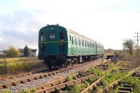 Preserved <I>'Thumper'</I> DEMU no 1302 approaching Blunsdon Station on the Swindon and Cricklade Railway on 12 November 2011.<br><br>[Peter Todd 12/11/2011]