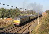 Tyseley based, green liveried, Brush Type 4 D1755 (47773) brings up the rear of <I>The Coronation Scot</I>, hauled by LMS Pacific 6201 <I>Princess Elizabeth</I> at Woodacre on 12 November [see image 36384]. The train was heading for Glasgow via Shap and Beattock. <br><br>[Mark Bartlett 12/11/2011]