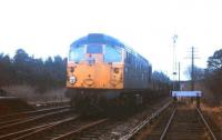 A northbound Sunday track-lifting train approaches St Boswells in the spring of 1971.<br><br>[David Spaven //1971]