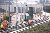 View east over Gogar tram depot on 15 November 2011, with the Airport line in the foreground.<br><br>[Bill Roberton 15/11/2011]