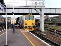 TMV DR98974 passing through Eastleigh station on 17 November en route to the Network Rail depot located within the Works.<br><br>[Peter Todd 17/11/2011]