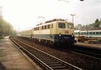 Northbound train for Koln sweeps through Remagen in 1997 behind a Class 110. All services were loco-hauled at that time - not a multiple unit to be seen. <br><br>[Colin Miller //1997]