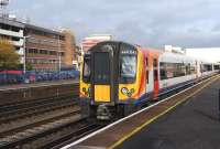 SWT 444 043 on a Waterloo - Southampton service calls at Eastleigh on 17 November 2011.<br><br>[Peter Todd 17/11/2011]