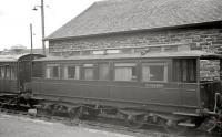 Standing in the yard at Wick in July 1963 is 8-wheel Inspection Coach no SC45038M. Originally built for the Lancashire and Yorkshire Railway at Newton Heath in 1878 as a 6-wheel Directors Saloon, it was subsequently converted to a bogie vehicle for use by the engineers department. The coach has since been restored and can be seen on display at Oxenhope Museum on the Keighley and Worth Valley Railway.<br><br>[R Sillitto/A Renfrew Collection (Courtesy Bruce McCartney) /07/1963]