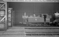 Class J88 0-6-0T no 68335 stands alongside the repair shop at Thornton Junction in 1959. After spending its post-nationalisation years at Thornton, the locomotive was transferred to Haymarket in late December that year, where its duties included shunting the yards at Gorgie East [see image 32639]. The 1904 veteran ended its days at Dawsholm in 1962.<br><br>[K A Gray //1959]
