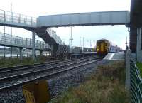 The 15.19 to Carlisle (ex-Glasgow Central) about to leave Gretna Green on 25 November 2011.<br><br>[Bruce McCartney 25/11/2011]