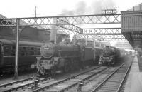 A busy afternoon scene at Stranraer Harbour in 1962. The Black 5s waiting on the centre roads are Stranraer's own 44789 nearest the camera, standing alongside 44801 from Hurlford.<br><br>[R Sillitto/A Renfrew Collection (Courtesy Bruce McCartney) //1962]