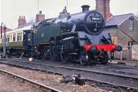 BR Standard class 4 2-6-4T no 80135 stands in the NYMR's Grosmont shed sidings on 16 April 1980. Note the old railway cottages still in place at this time [see image 19379].<br><br>[Peter Todd 16/04/1980]