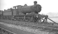 Withdrawn from Machynlleth the previous month, Collett 0-6-0 no 2233 is 'stored' pending disposal alongside Oswestry shed in October 1961.<br><br>[K A Gray 02/10/1961]