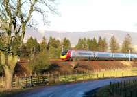 A Virgin Pendolino runs south towards the Clyde Viaduct at Lamington on Christmas Eve 2005.<br><br>[John Furnevel 24/12/2005]