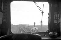 View from the rear of a Stranraer-bound Swindon-built DMU approaching Challoch Junction in 1962. The 'Port Road' to Dumfries (closed 1965) is on the right, with the Ayr line turning north to the left. [With thanks to Messrs Robin, Connell, Taylor, Roberts & Petrie]  <br><br>[R Sillitto/A Renfrew Collection (Courtesy Bruce McCartney) //1962]