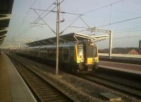 The 0702 to London Euston blinks in the early morning March sunlight at Rugby [see image 36505]. If winter comes, can spring be far behind? (Yeats, I think)<br><br>[Ken Strachan 25/03/2011]