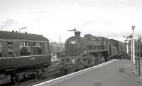 Steam meets diesel at Kilwinning in July 1962. Note the Caledonian semaphore route indicator carried by the steam locomotive.<br><br>[R Sillitto/A Renfrew Collection (Courtesy Bruce McCartney) 01/07/1962]