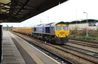 A Network Rail ballast train runs through Westbury on 8 December 2011 behind Bardon Aggregates 66623 <I>Bill Bolsover</I>.<br><br>[Peter Todd 08/12/2011]