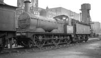 Ex-Midland 0-6-0 no 58131 photographed on Kentish Town shed, north London, towards the end of its working life. The locomotive had been built by Dubs & Co at their Queens Park works in Glasgow during the last quarter of the 19th century. (Dubs became part of the newly formed North British Locomotive Co in 1903 - then the largest locomotive builder in Europe.) No 58131 was withdrawn from Kentish Town in February 1961 and cut up at Derby Works later that year. <br><br>[K A Gray //]