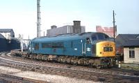 On a fine evening in June 1970, Peak No. D170 grinds round the sharp curve on the up goods line at the west end of Newcastle Central station. The train is thought to be a return working of 'Freightliner' flats from South Gosforth to Follingsby with the locomotive still displaying the reporting number from a previous working.<br><br>[Bill Jamieson 18/06/1970]