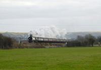 West Country Pacific no 34067 <I>Tangmere</I> heading north out of Westbury on the Bath line on 10 December 2011. The train is the 'Bath Christmas Market Special' from Three Bridges to Bristol, seen here approaching Trowbridge, Wiltshire.<br><br>[Peter Todd 10/12/2011]