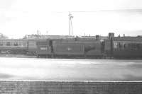 Looking across Eastleigh station in the early 1960s with a Drummond 0-4-4T standing with a train beyond the far platform.<br><br>[Robin Barbour Collection (Courtesy Bruce McCartney) //]