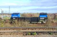 New style container traffic for the tip - seen at Didcot on 15 December 2011.<br><br>[Peter Todd 15/12/2011]