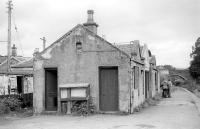 Closed to passengers in 1965, Aberlour station building is seen here on 14 October 1978, complete with weighing machine, noticeboards and GENTLEMEN sign still in place [see image 36839]. <br>
<br><br>[Bill Roberton 14/10/1978]