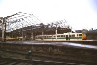 A Class 141 DMU stands at a dismal looking Huddersfield station on a dull November day in 1984.<br><br>[Ian Dinmore /11/1984]