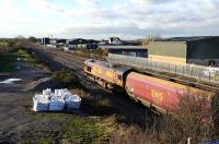 DBS 66069 is about to leave the westbound loop at Challow on 5 December with coal empties from Didcot power station returning to Avonmouth.<br><br>[Peter Todd 05/12/2011]