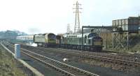 The late running 01.40 Whitemoor - Millerhill fitted freight, hauled by EE Type 4 No. D360, has been put into the down loop at Berwick on Saturday 11th April 1970 to allow the unhindered passage of the 08.40 Leeds - Edinburgh. Brush Type 4 No. D1102 is in charge on this occasion. <br><br>[Bill Jamieson 11/04/1970]