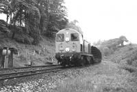 An EE Type 1 westbound near Cumbernauld in June 1967 with a trainload of track panels.<br><br>[Colin Miller /06/1967]