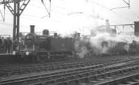 47202+47383 stand in the rain at Stockport on 26 November 1966 with the MRTC <I>'Three Counties Special'</I> after bringing in the train from Bury Bolton Street. From here the tour continued on to Buxton behind Ivatt 2-6-2T no 41204, which is waiting on the right of the picture to take over.<br><br>[K A Gray 26/11/1966]