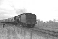 B1 no 61324 near Roxburgh Junction on 14 April 1963 with the SLS/BLS <I>Scottish Rambler No.2</I> (Joint Easter Rail Tour) which included a visit to the Jedburgh branch. [See image 34310]<br><br>[K A Gray 14/04/1963]