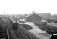 View over Largs goods yard in March 1963, with the station on the left.<br><br>[R Sillitto/A Renfrew Collection (Courtesy Bruce McCartney) 30/03/1963]