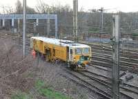 Taking advantage of the Christmas closure for some permanent way work, Colas 73909 <I>Saturn</I> is seen operating at the south end of an otherwise deserted Preston station. Sister machine 73910 <I>Jupiter</I> was similarly employed nearby. There is no other apparent connection between the late lamented Cal-Mac Clyde <I>Streakers</I> and these very functional plant machines.<br><br>[Mark Bartlett 26/12/2011]