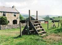 This fine NER concrete stile can be found near Mickleton on the Middleton-in-Teesdale branch. View looks North-East.<br><br>[Ken Strachan 23/05/2010]